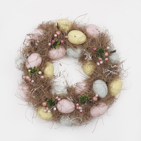 Wreath with eggs in grass