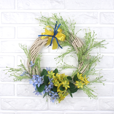 Flower arrangement on a wicker wreath