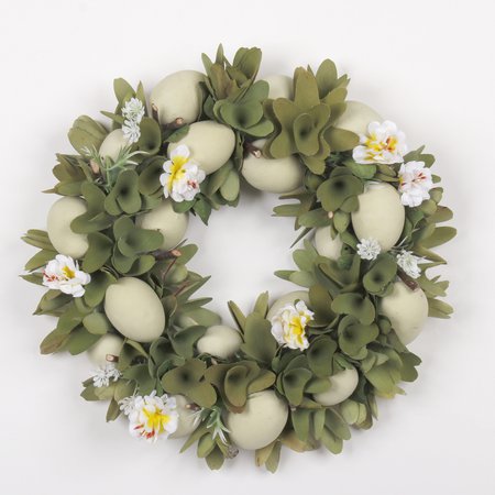 Wreath with eggs and wooden leaves with a clover