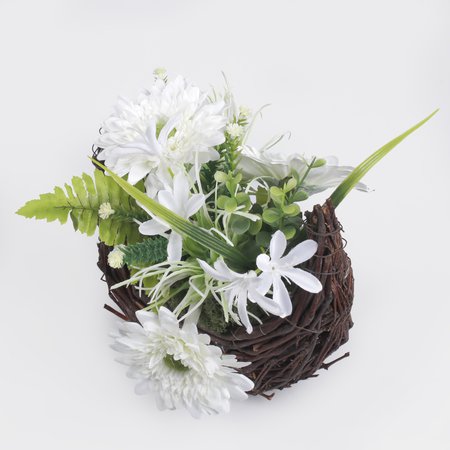 Flower arrangement in a basket of fascines